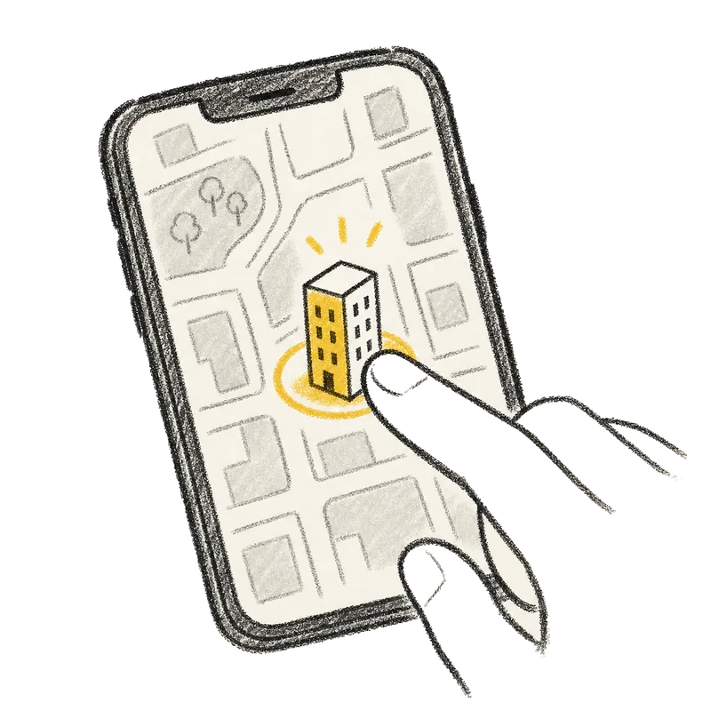 地図上で建物を候補化するスマホ画面の図解